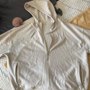 Cream colored women’s zip up hoodie